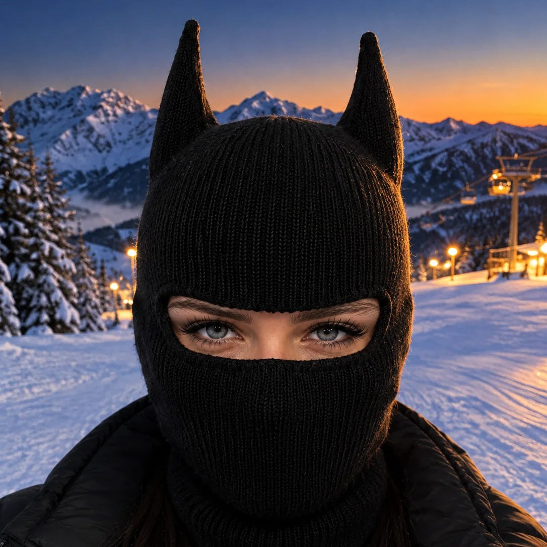 NightCowls bat-ear ski mask on the slopes at dusk